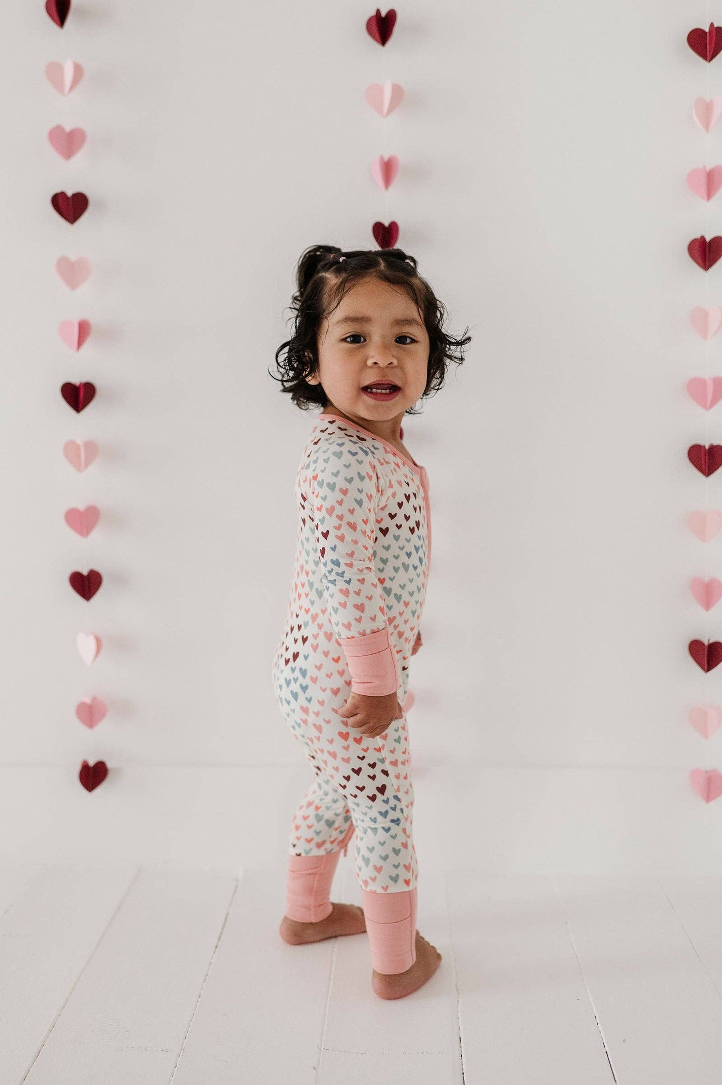 Long Sleeve Zip Romper- Rainbow Hearts