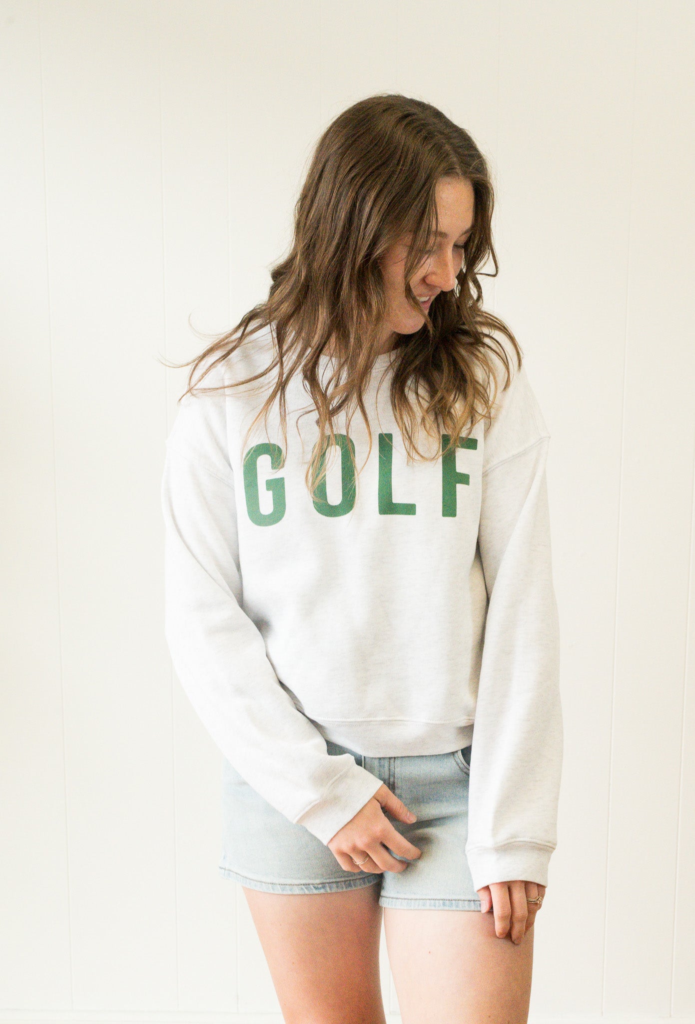 Golf Mid length Cropped Graphic Fleece Pullover Relaxed Fit.