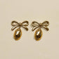 Gold Waterproof Football & Bow Drop Stud Earrings